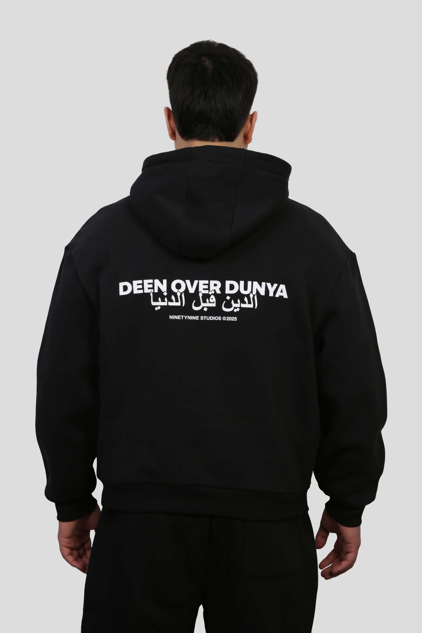 www.ninetyninestudios.de| DEEN OVER DUNYA TRACKSUIT HOODIE BLACK | Revolutionary Islamic Streetwear | 99Studios