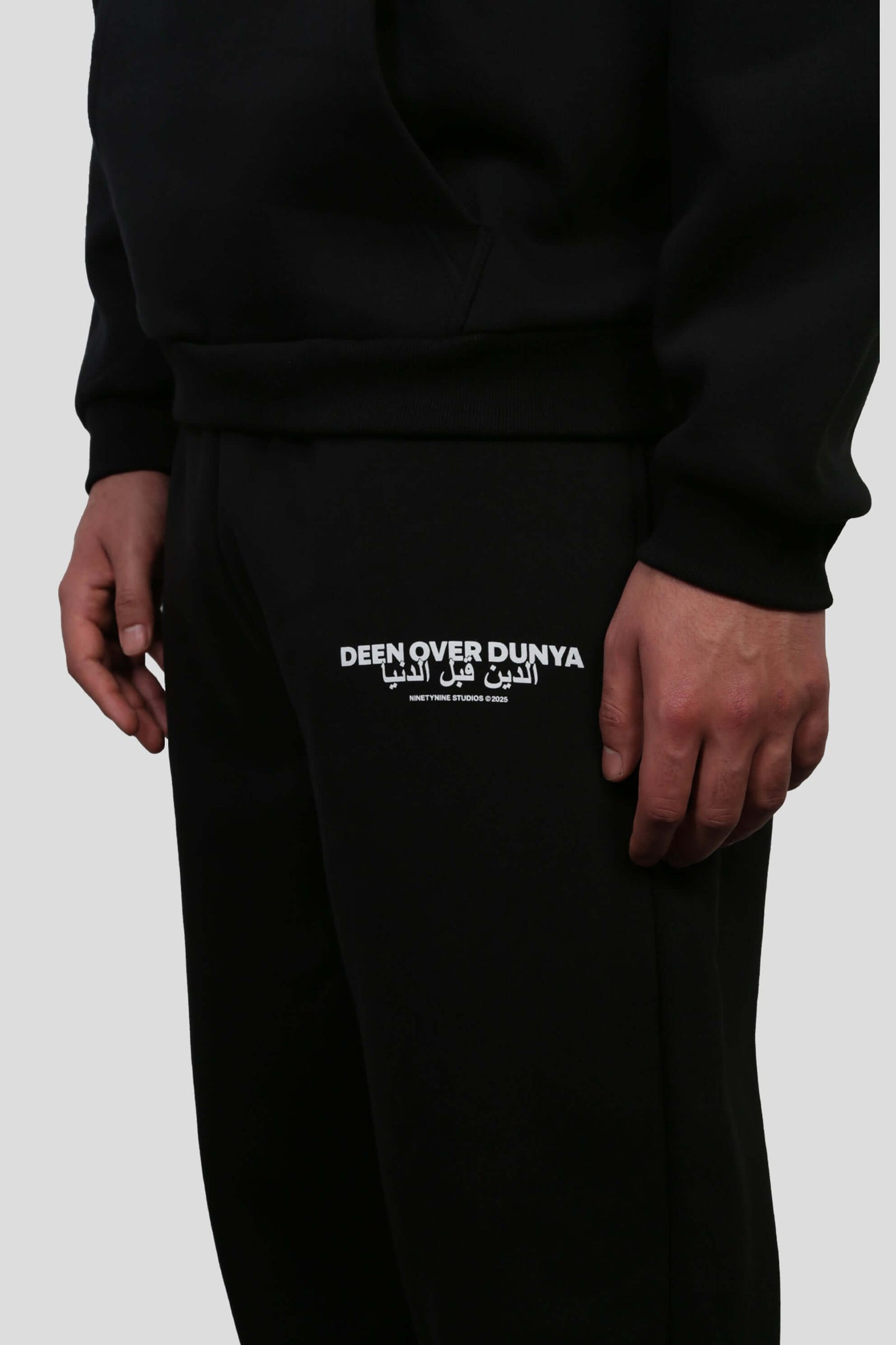 www.ninetyninestudios.de| DEEN OVER DUNYA CUFFED LEG JOGGER BLACK | Revolutionary Islamic Streetwear | 99Studios