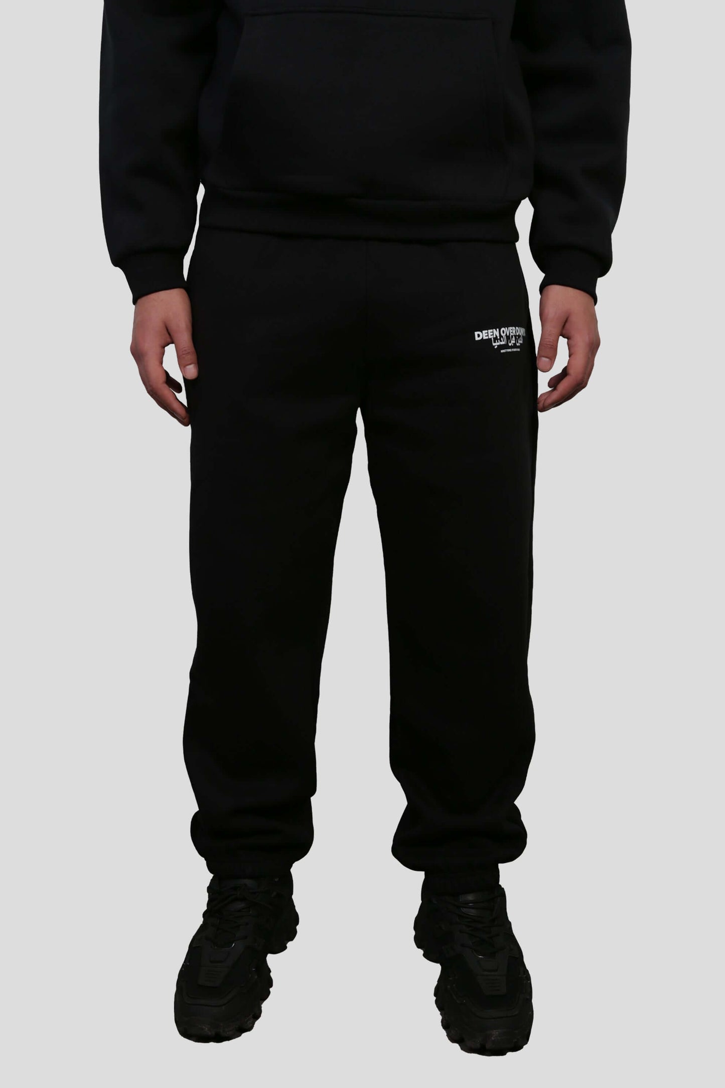 www.ninetyninestudios.de| DEEN OVER DUNYA CUFFED LEG JOGGER BLACK | Revolutionary Islamic Streetwear | 99Studios