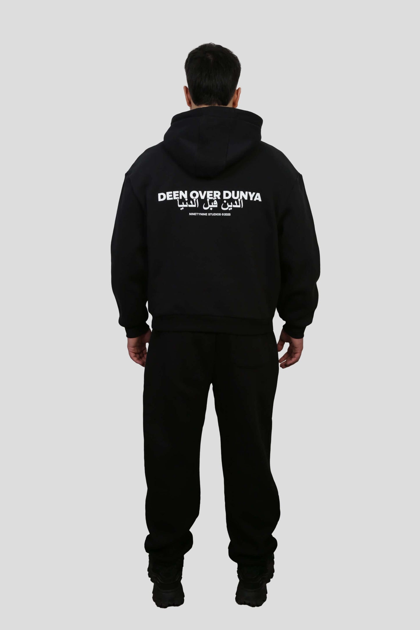 www.ninetyninestudios.de| DEEN OVER DUNYA TRACKSUIT HOODIE BLACK | Revolutionary Islamic Streetwear | 99Studios