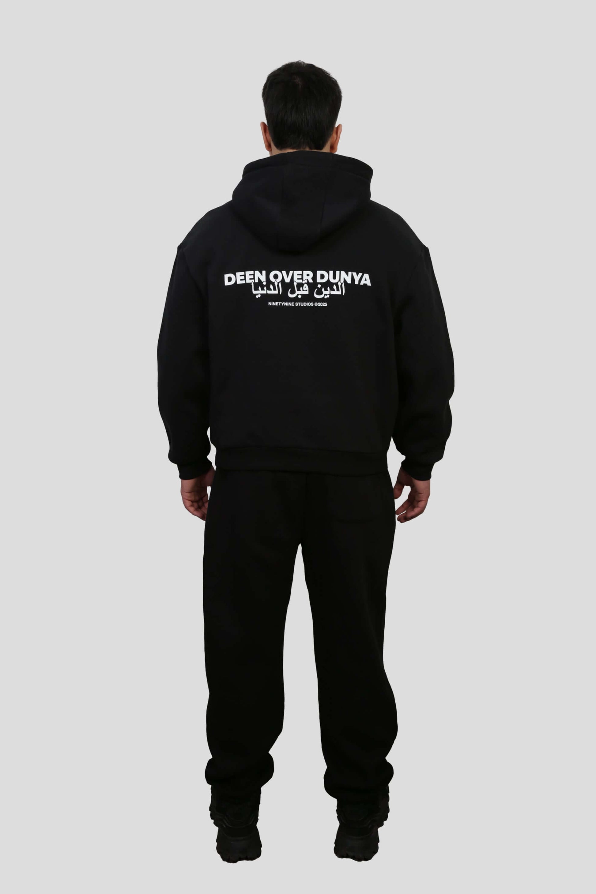 www.ninetyninestudios.de| DEEN OVER DUNYA TRACKSUIT HOODIE BLACK | Revolutionary Islamic Streetwear | 99Studios